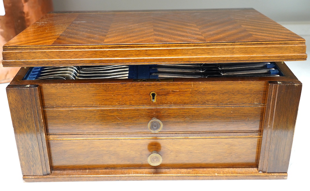 A 1930's mahogany cased canteen of Old English pattern flatware, canteen 45.5cm wide. Condition - case fair, flatware good